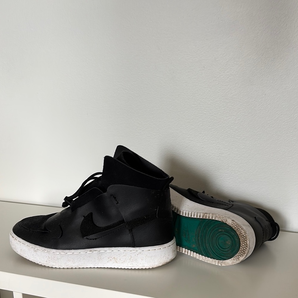 Nike Black Sneakers with Green and Yellow Sole Accent